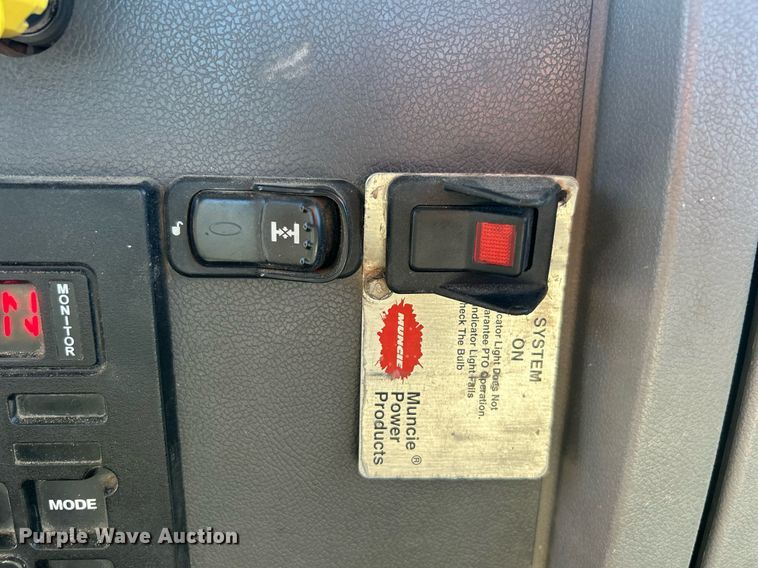 image for item DN0607 2014 Peterbilt 330  dump flatbed truck