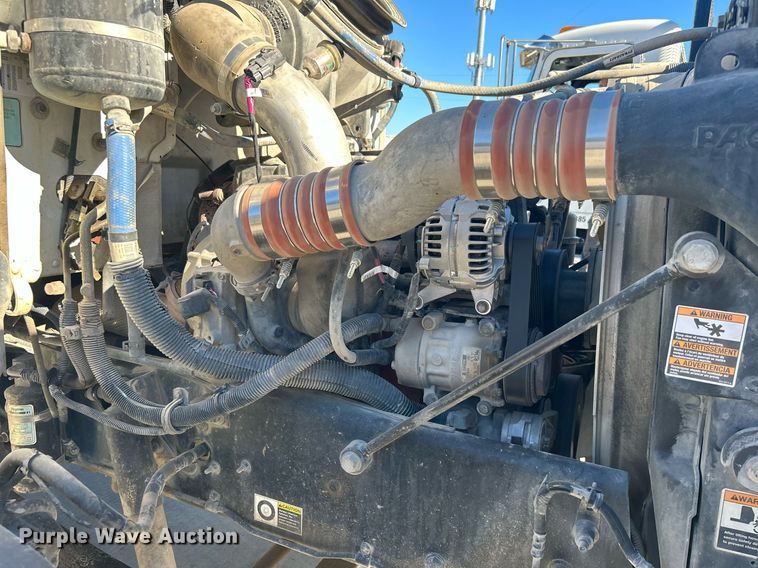 image for item DN0607 2014 Peterbilt 330  dump flatbed truck