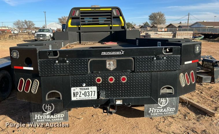 image for item JT9204 2012 Ford F650 Super Duty  Crew Cab flatbed truck