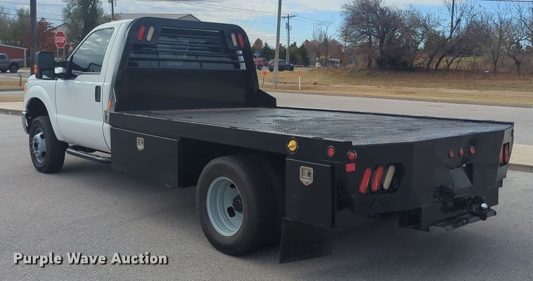 image for item OL9187 2016 Ford F350 Super Duty  flatbed pickup truck