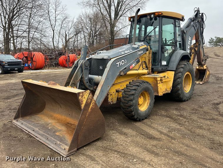 image for item DQ1068 2009 John Deere 710J  backhoe