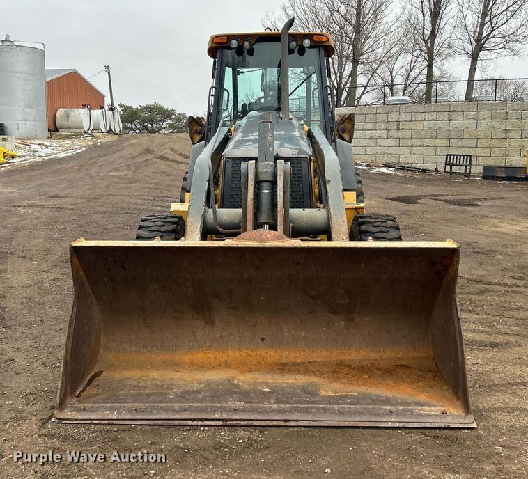 image for item DQ1068 2009 John Deere 710J  backhoe