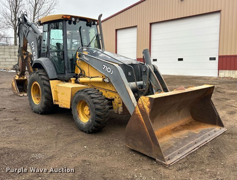image for item DQ1068 2009 John Deere 710J  backhoe
