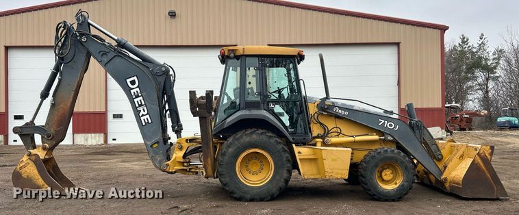 image for item DQ1068 2009 John Deere 710J  backhoe