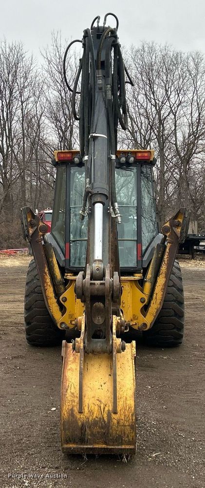 image for item DQ1068 2009 John Deere 710J  backhoe