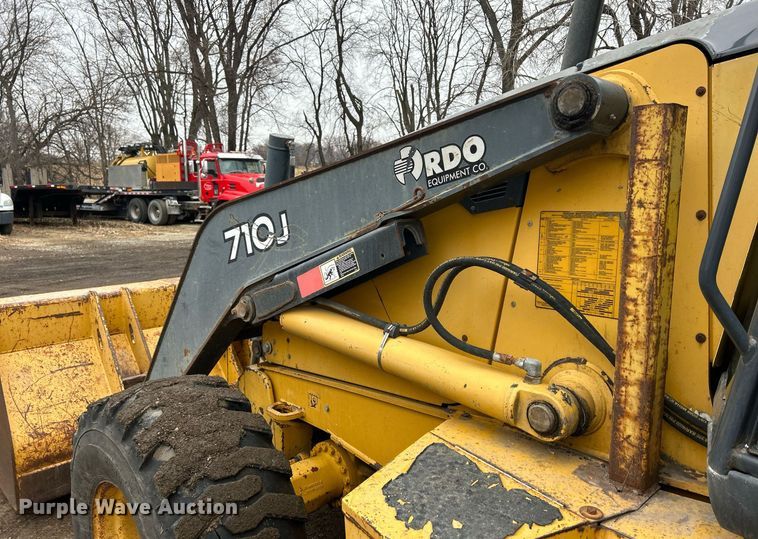 image for item DQ1068 2009 John Deere 710J  backhoe