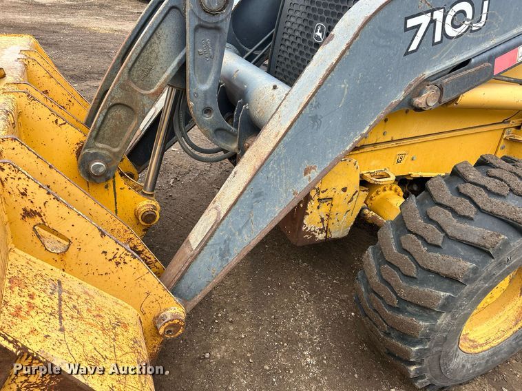 image for item DQ1068 2009 John Deere 710J  backhoe