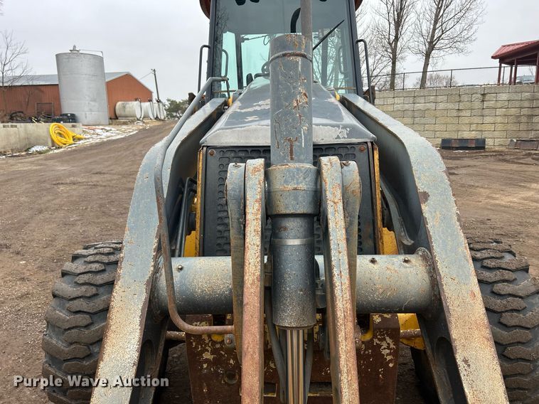 image for item DQ1068 2009 John Deere 710J  backhoe