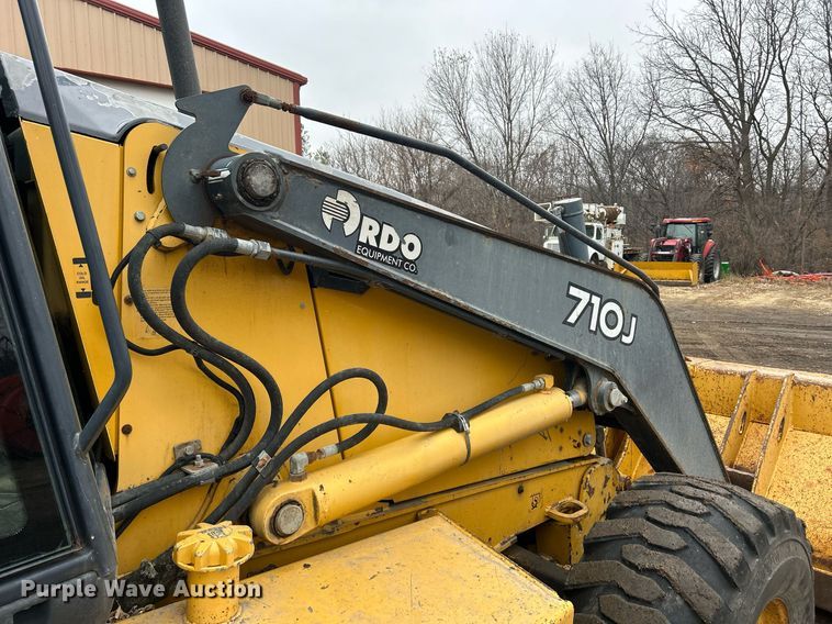 image for item DQ1068 2009 John Deere 710J  backhoe