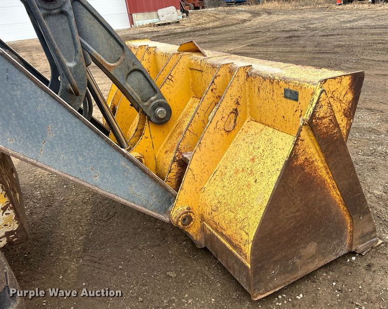 image for item DQ1068 2009 John Deere 710J  backhoe