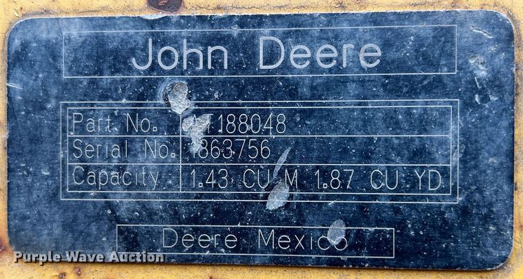 image for item DQ1068 2009 John Deere 710J  backhoe