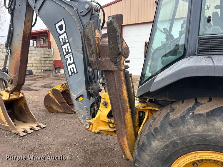 image for item DQ1068 2009 John Deere 710J  backhoe