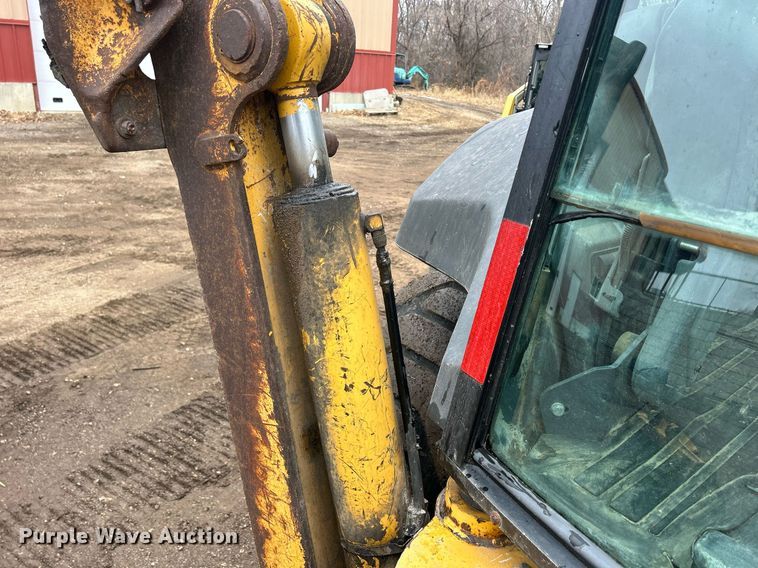 image for item DQ1068 2009 John Deere 710J  backhoe