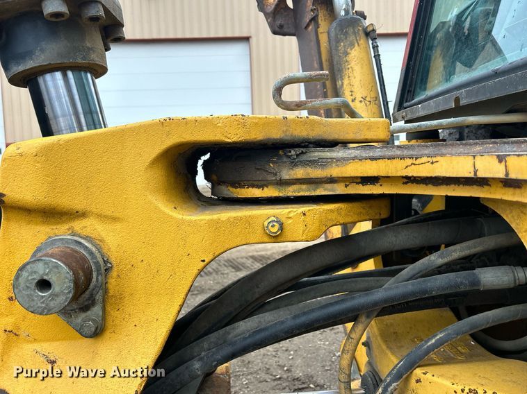 image for item DQ1068 2009 John Deere 710J  backhoe