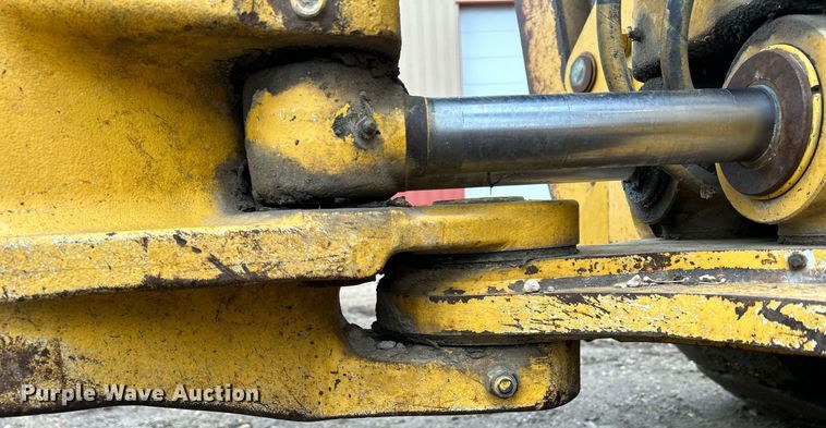 image for item DQ1068 2009 John Deere 710J  backhoe