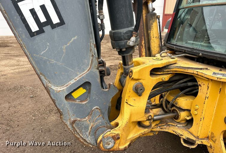 image for item DQ1068 2009 John Deere 710J  backhoe