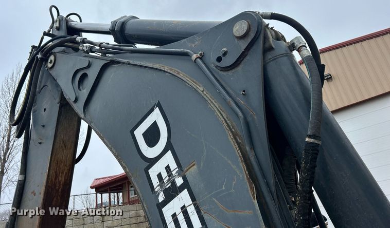 image for item DQ1068 2009 John Deere 710J  backhoe