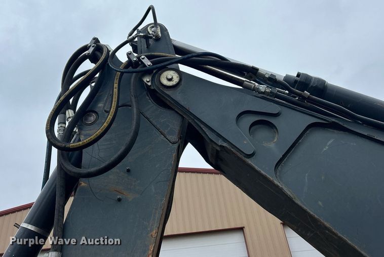 image for item DQ1068 2009 John Deere 710J  backhoe