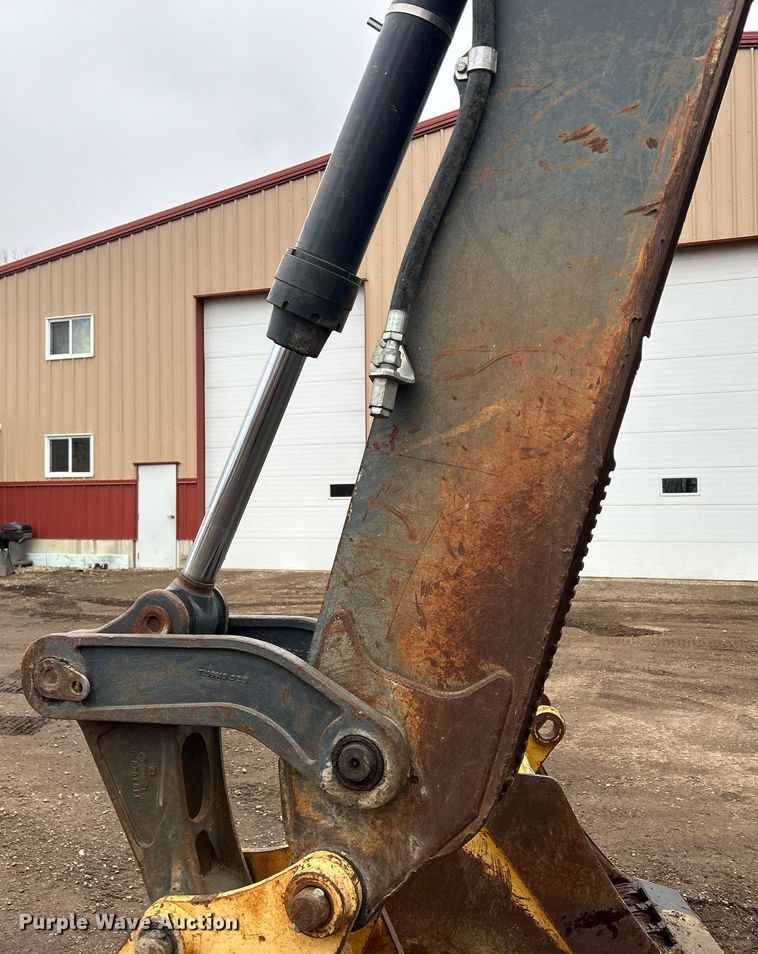 image for item DQ1068 2009 John Deere 710J  backhoe