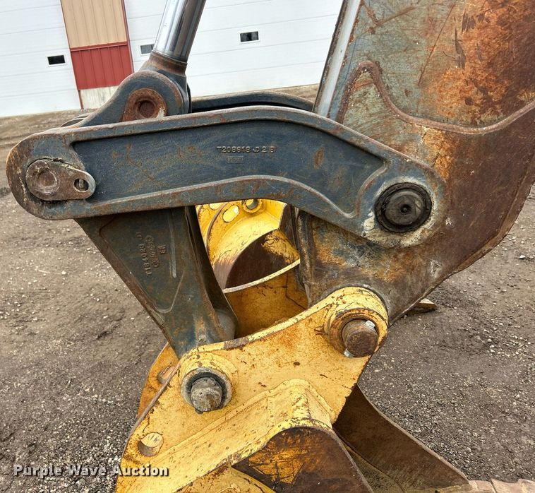 image for item DQ1068 2009 John Deere 710J  backhoe