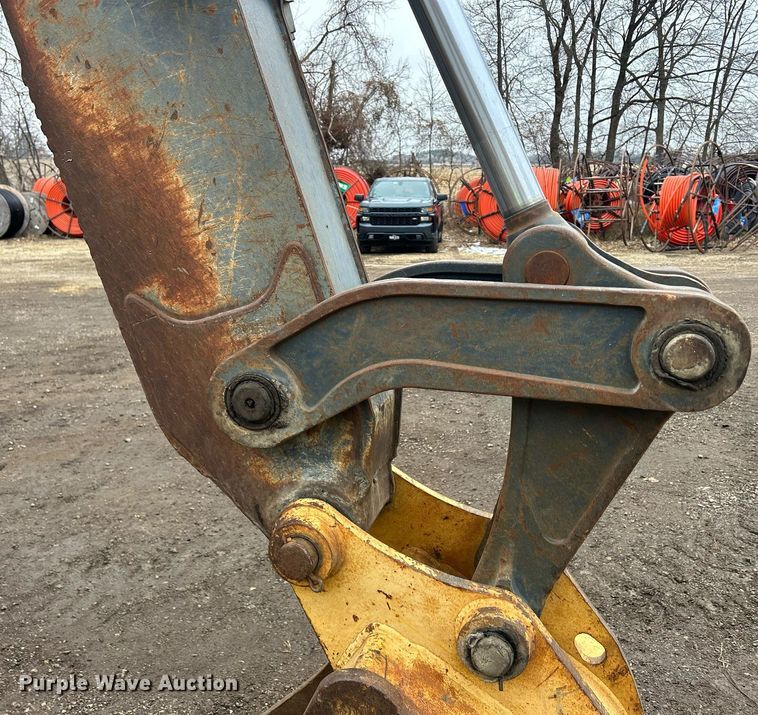 image for item DQ1068 2009 John Deere 710J  backhoe