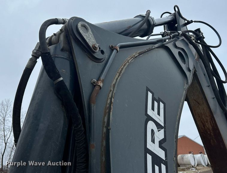 image for item DQ1068 2009 John Deere 710J  backhoe