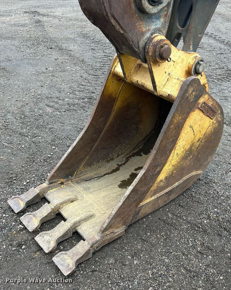 image for item DQ1068 2009 John Deere 710J  backhoe