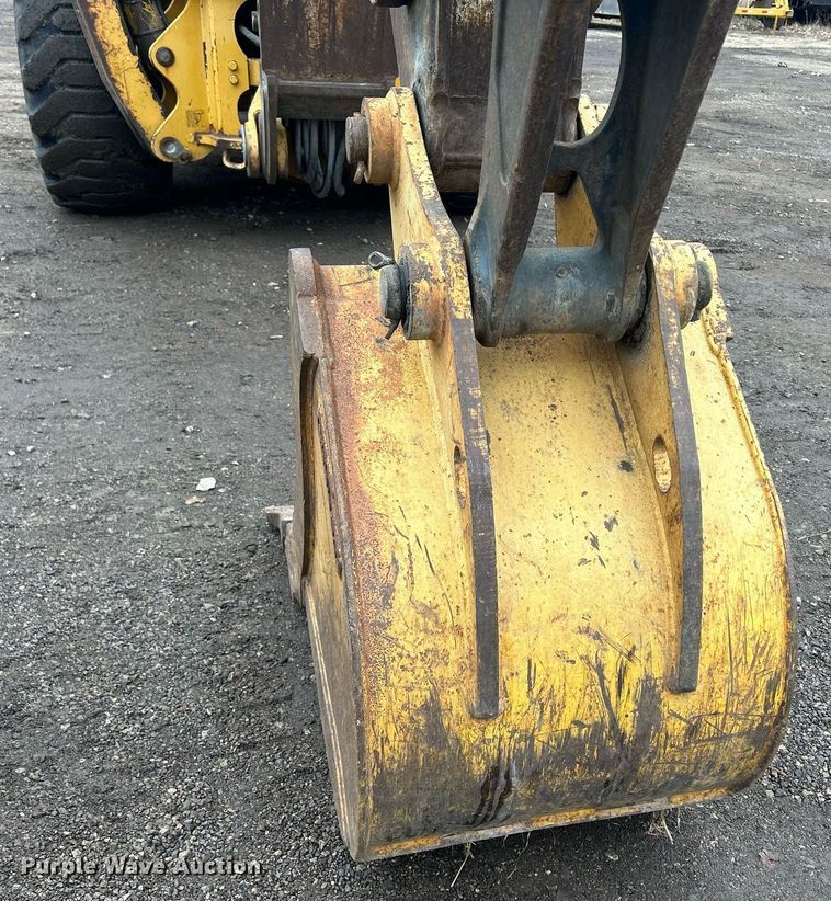 image for item DQ1068 2009 John Deere 710J  backhoe