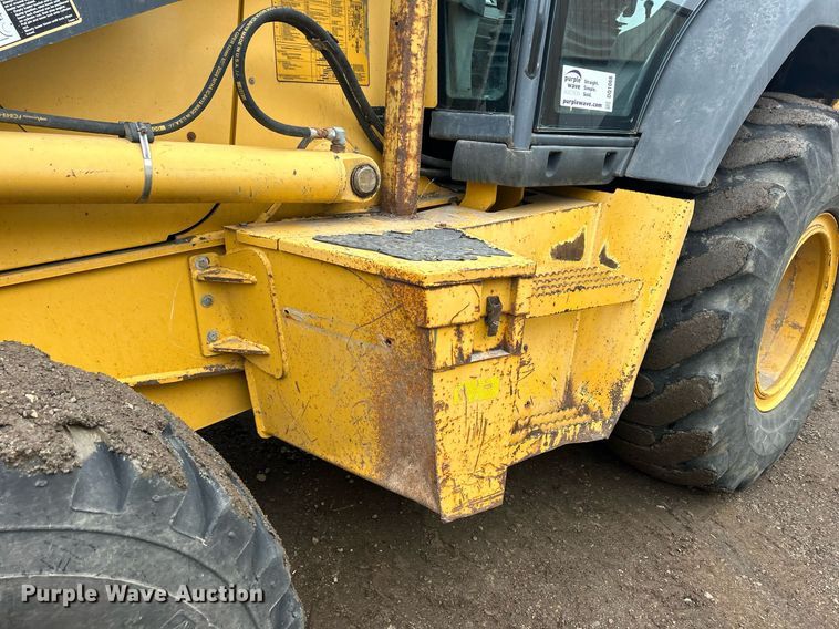 image for item DQ1068 2009 John Deere 710J  backhoe