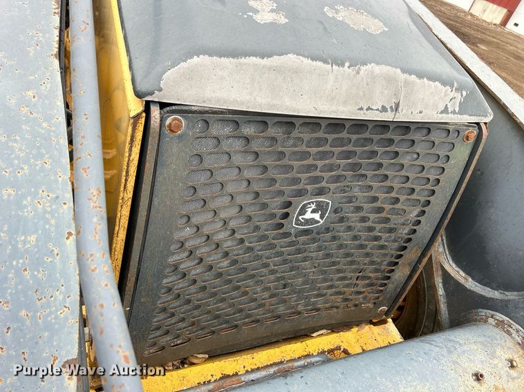 image for item DQ1068 2009 John Deere 710J  backhoe