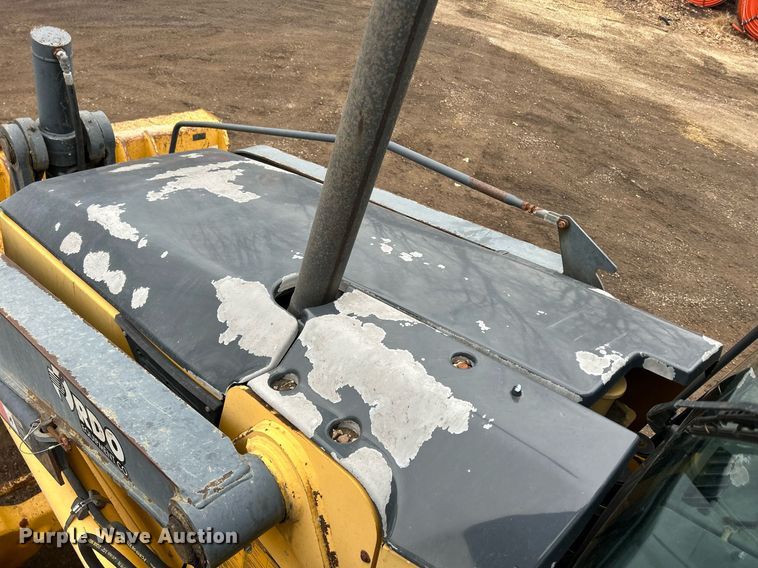 image for item DQ1068 2009 John Deere 710J  backhoe