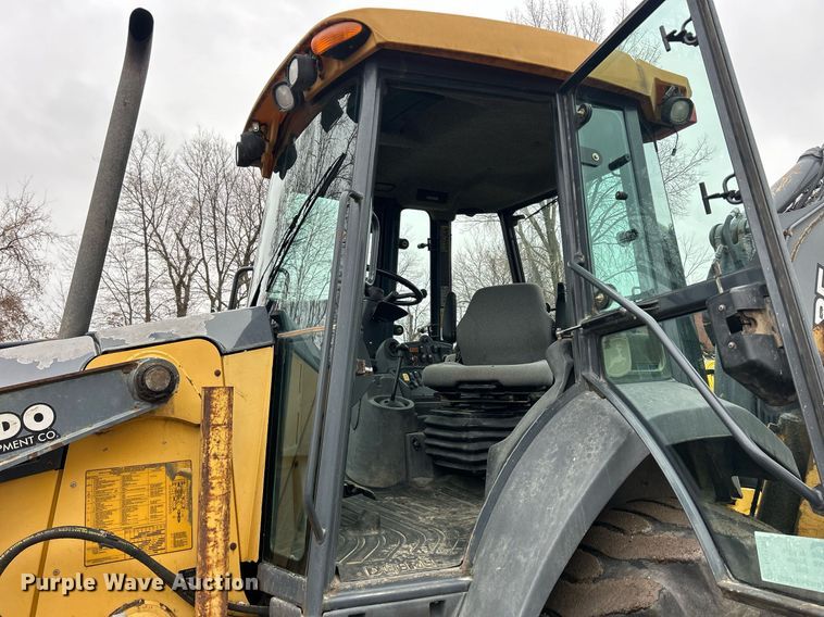 image for item DQ1068 2009 John Deere 710J  backhoe