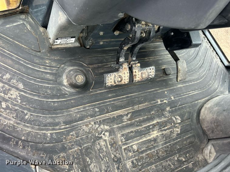 image for item DQ1068 2009 John Deere 710J  backhoe