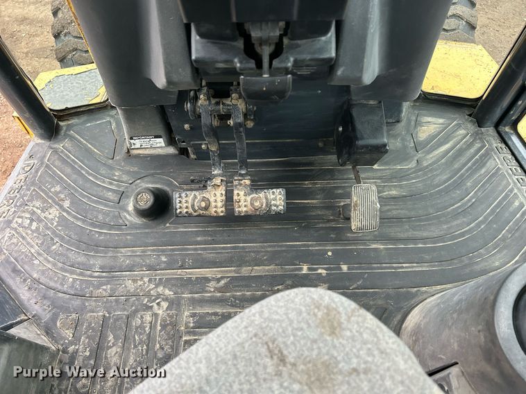 image for item DQ1068 2009 John Deere 710J  backhoe