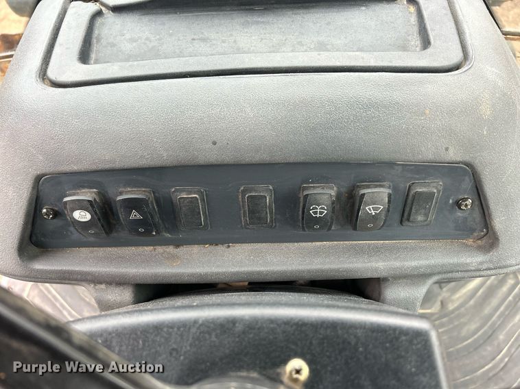 image for item DQ1068 2009 John Deere 710J  backhoe