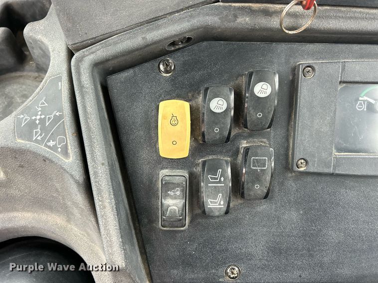 image for item DQ1068 2009 John Deere 710J  backhoe