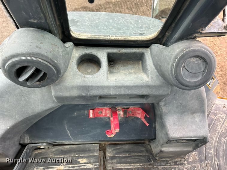 image for item DQ1068 2009 John Deere 710J  backhoe