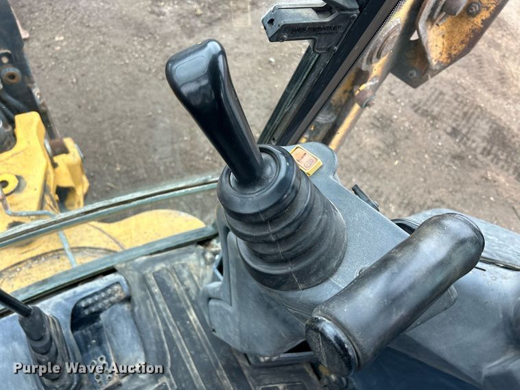 image for item DQ1068 2009 John Deere 710J  backhoe