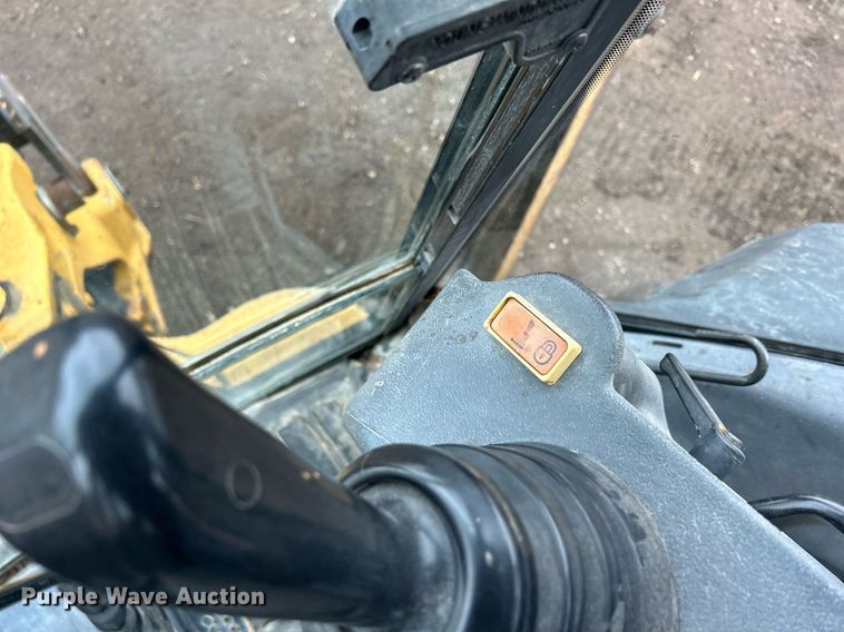 image for item DQ1068 2009 John Deere 710J  backhoe