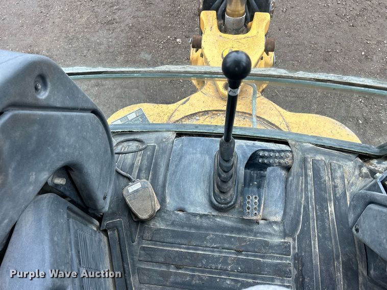 image for item DQ1068 2009 John Deere 710J  backhoe