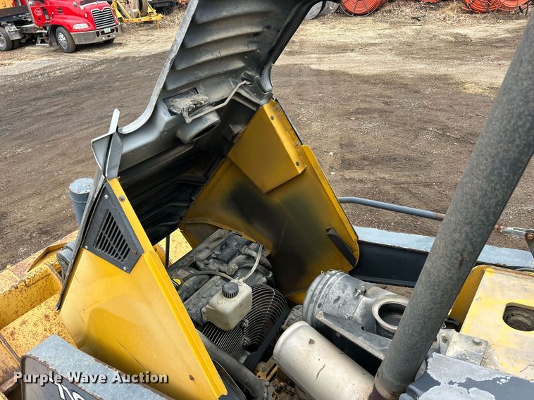 image for item DQ1068 2009 John Deere 710J  backhoe