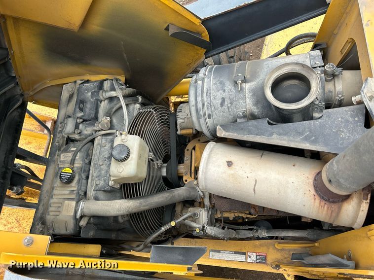 image for item DQ1068 2009 John Deere 710J  backhoe