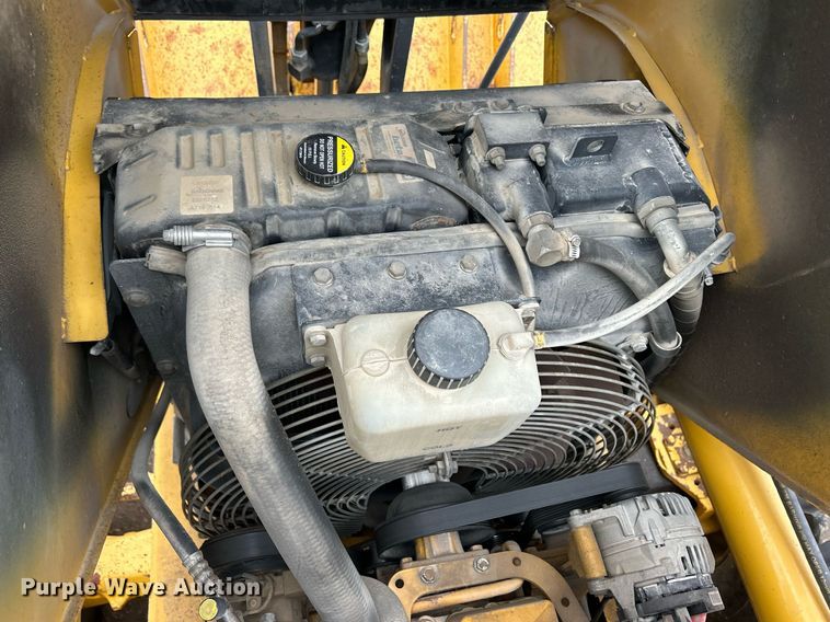 image for item DQ1068 2009 John Deere 710J  backhoe