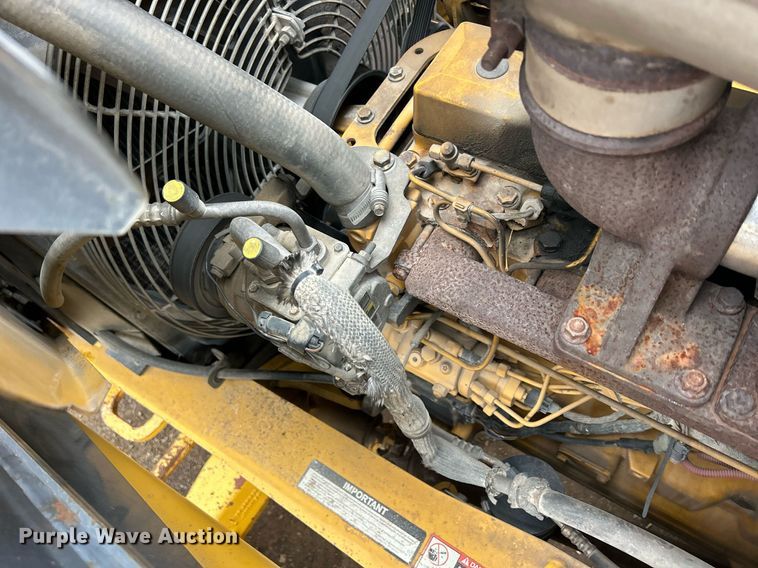 image for item DQ1068 2009 John Deere 710J  backhoe