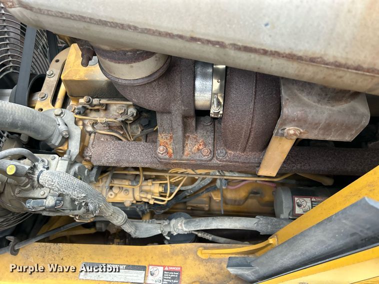 image for item DQ1068 2009 John Deere 710J  backhoe