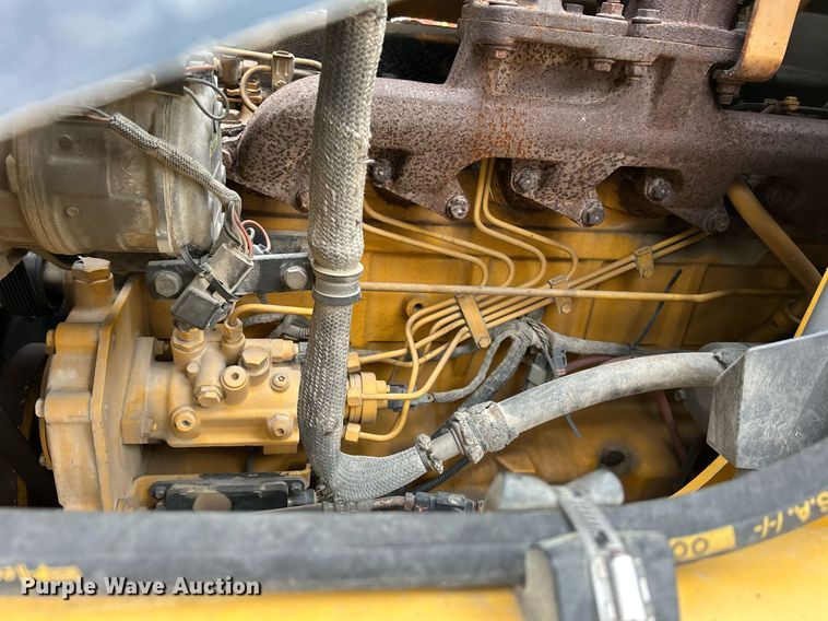 image for item DQ1068 2009 John Deere 710J  backhoe