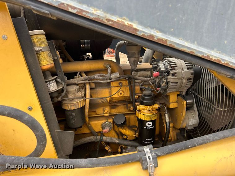 image for item DQ1068 2009 John Deere 710J  backhoe