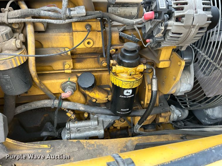 image for item DQ1068 2009 John Deere 710J  backhoe