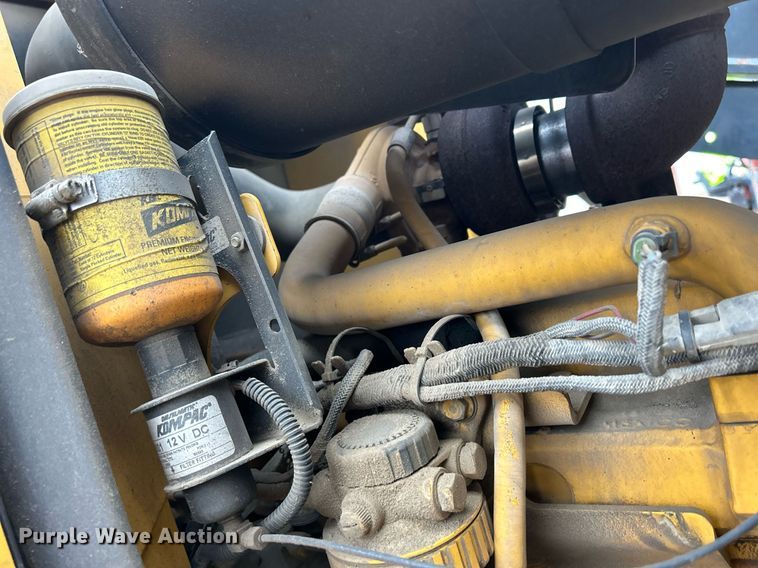 image for item DQ1068 2009 John Deere 710J  backhoe