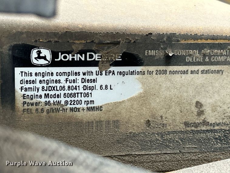 image for item DQ1068 2009 John Deere 710J  backhoe